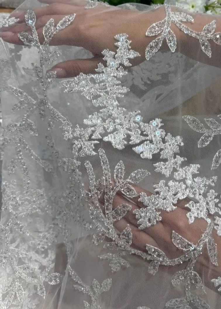 La Creazione — lavorazione artigianale dell'abito